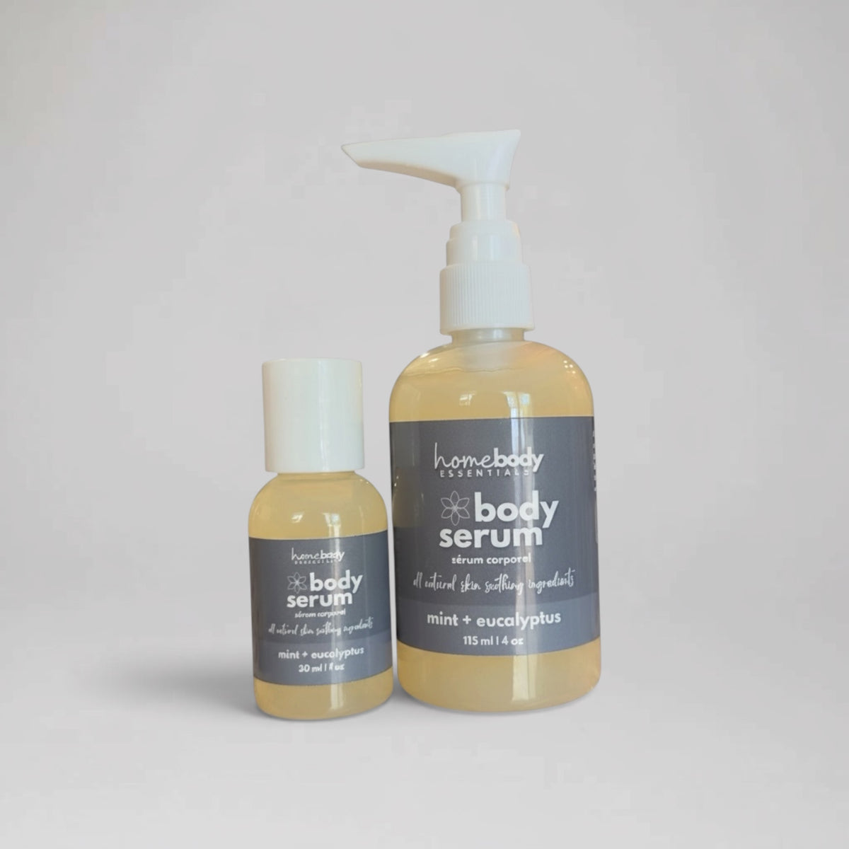 Full Size and Travel Size bottles of Mint + Eucalyptus Body Serum handmade in Saskatoon, Saskatchewan, Canada
